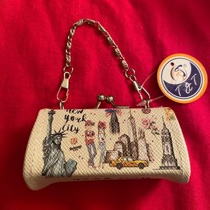 \New NYC coin purse. Opens wide for easy coin find